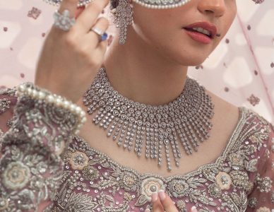 Beautiful woman wearing a diamond look party wear necklace from Veeriva